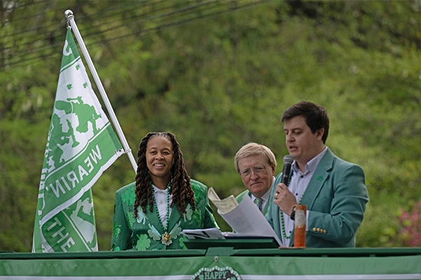 Seimone Augustus, Pat Shingleton and Dixon McMakin during the opening ceremonies of the 2024 Wearin' of the Green parade