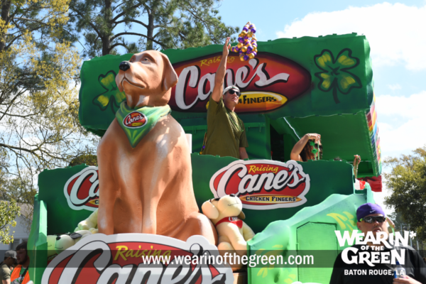 LSU Head Coach Lane Kiffen aboard Raising Canes float